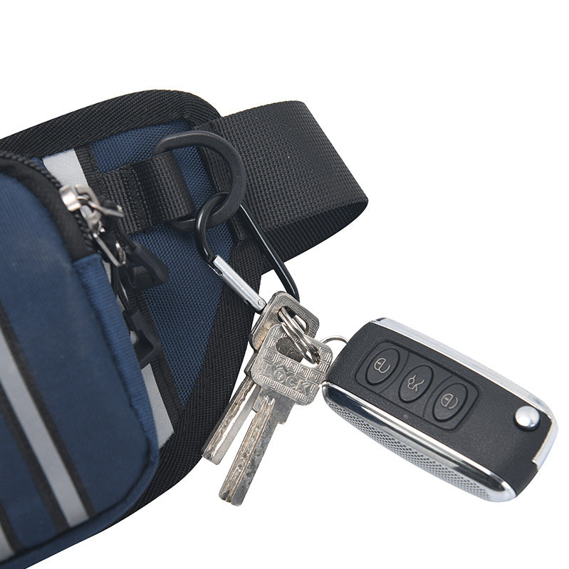 Blue bag with keys and a car keychain on a white background