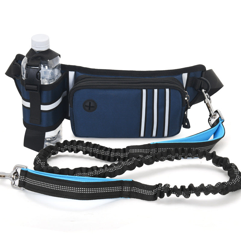 Navy waist bag with water bottle holder and bungee cord on a white background